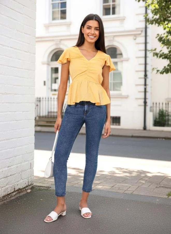 Women Fit and Flared Textured V neck Half Sleeves Peplum Top
